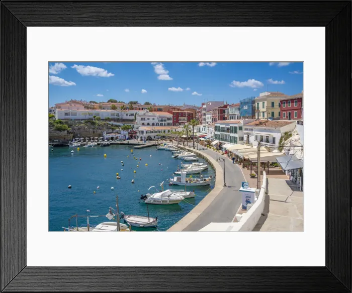 Framed Print : View of colourful cafes, restaurants and boats in harbour against blue sky, Cales Fonts, Menorca, Balearic Islands, Spain, Mediterranean, Europe Framed Print : View of colourful cafes, restaurants and boats in harbour against blue sky, Cales Fonts, Menorca, Balearic Islands, Spain, Mediterranean, Europe