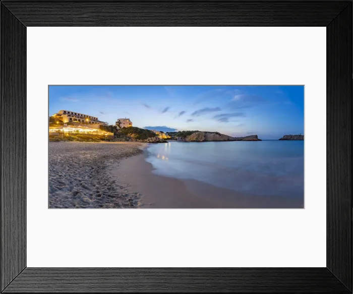 Framed Print : Hotels and whitewashed buildings overlooking beach at dusk in Arenal d en Castell, Es Mercadal, Menorca, Balearic Islands, Spain, Mediterranean, Europe