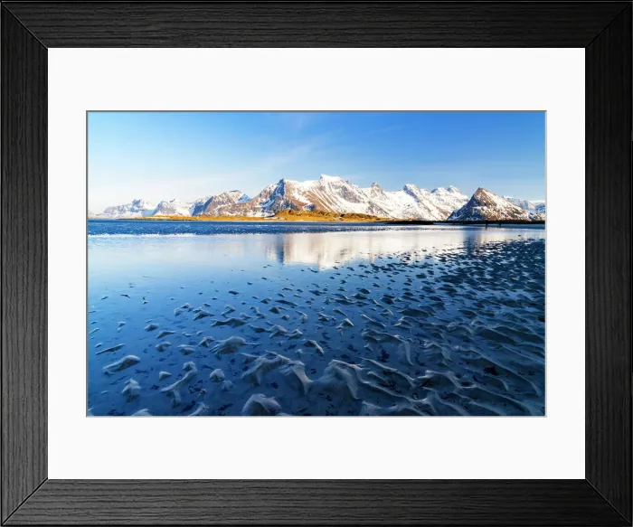 Framed Print : Waves of the cold sea crashing on the beach with snowy mountains on background, Fredvang, Nordland, Lofoten Islands, Norway, Europe Framed Print : Waves of the cold sea crashing on the beach with snowy mountains on background, Fredvang, Nordland, Lofoten Islands, Norway, Europe