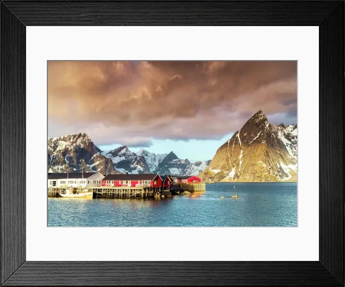 Framed Print : Storm clouds at dawn over mountain peaks and fishing village of Sakrisoy, Reine, Nordland county, Lofoten Islands, Norway, Europe Framed Print : Storm clouds at dawn over mountain peaks and fishing village of Sakrisoy, Reine, Nordland county, Lofoten Islands, Norway, Europe