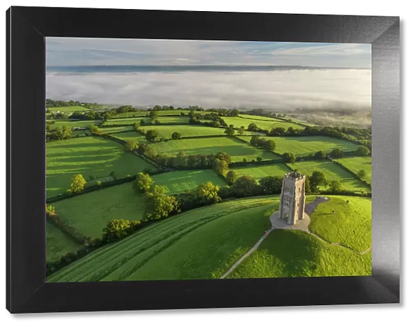 Early morning mists at St. Michaels Tower on Glastonbury Tor in Somerset, England, United Kingdom, Europe