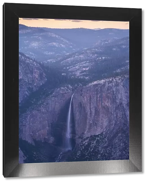 Dusk falls over Yosemite Falls in Yosemite National Park, UNESCO World Heritage Site, California, United States of America, North America