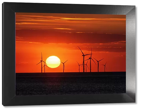 Offshore wind farm with amazing sunset, New Brighton, Cheshire, England, United Kingdom, Europe