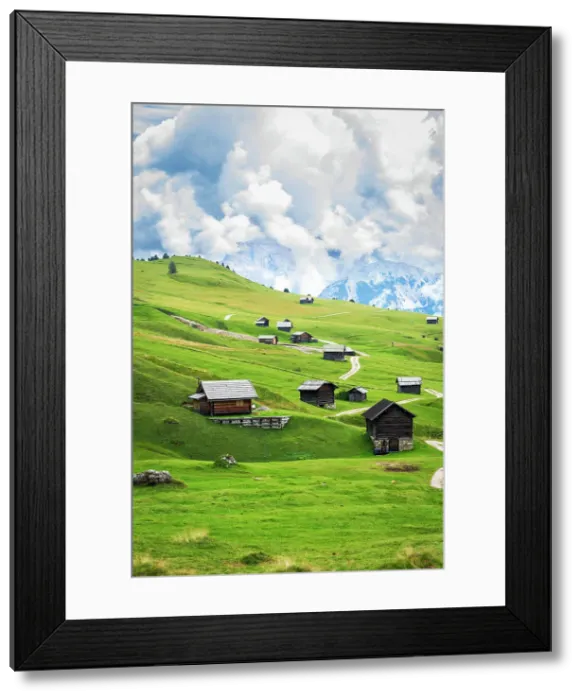 Framed Print : Typical wooden mountain huts on green fields, Sass de Putia, Dolomites, Passo delle Erbe, South Tyrol, Italy, Europe Framed Print : Typical wooden mountain huts on green fields, Sass de Putia, Dolomites, Passo delle Erbe, South Tyrol, Italy, Europe