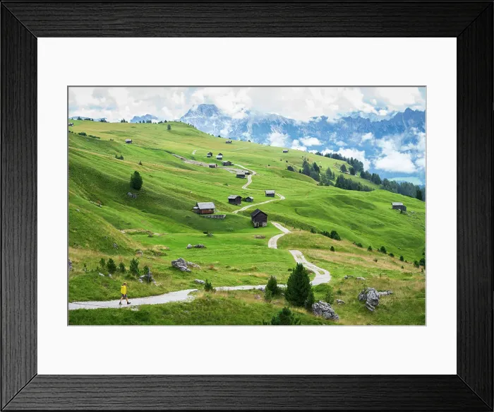 Framed Print : Hiker on footpath among green fields and wooden huts, Sass de Putia, Passo delle Erbe, Dolomites, South Tyrol, Italy, Europe Framed Print : Hiker on footpath among green fields and wooden huts, Sass de Putia, Passo delle Erbe, Dolomites, South Tyrol, Italy, Europe