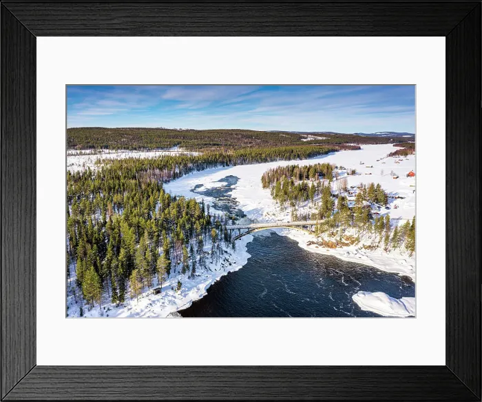 Framed Print : Aerial view of bridge above the scenic Jockfall waterfall in winter, Overkalix, Norrbotten county, Lapland Sweden Framed Print : Aerial view of bridge above the scenic Jockfall waterfall in winter, Overkalix, Norrbotten county, Lapland Sweden