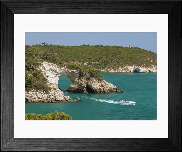 Framed Print : Boat passing under Arco di San Felice arch with Torre Gattarella behind, Vieste, Gargano peninsula, Foggia province, Puglia, Italy, Europe Framed Print : Boat passing under Arco di San Felice arch with Torre Gattarella behind, Vieste, Gargano peninsula, Foggia province, Puglia, Italy, Europe
