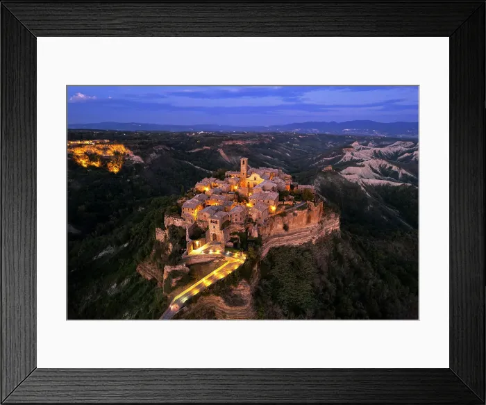 Framed Print : Aerial view of the medieval village of Civita di Bagnoregio lit at dusk, Viterbo province, Latium (Lazio), Italy, Europe Framed Print : Aerial view of the medieval village of Civita di Bagnoregio lit at dusk, Viterbo province, Latium (Lazio), Italy, Europe