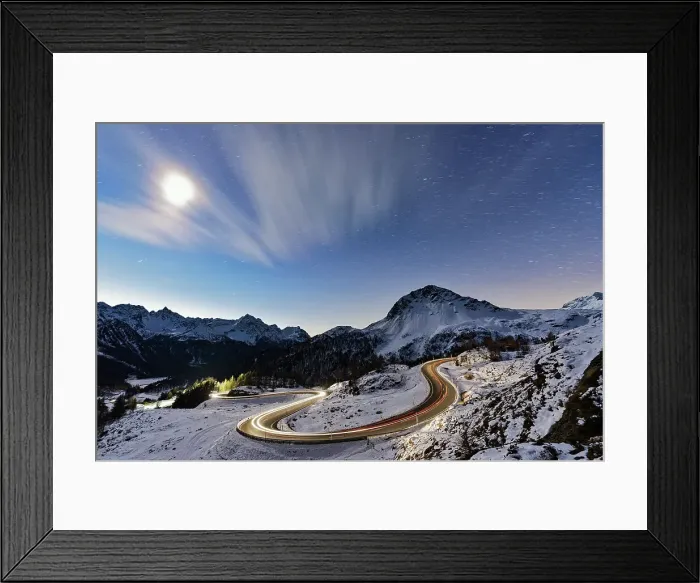 Framed Print : Full moon glowing over a snowy mountain road lit by car trails, Bernina Pass, Val Poschiavo, Graubunden canton, Switzerland, Europe Framed Print : Full moon glowing over a snowy mountain road lit by car trails, Bernina Pass, Val Poschiavo, Graubunden canton, Switzerland, Europe