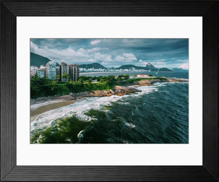 Framed Print : Aerial drone view of Arpoador section of Ipanema Beach with Copacabana and Sugarloaf Mountain visible in the background, Rio de Janeiro, Brazil, South America Framed Print : Aerial drone view of Arpoador section of Ipanema Beach with Copacabana and Sugarloaf Mountain visible in the background, Rio de Janeiro, Brazil, South America