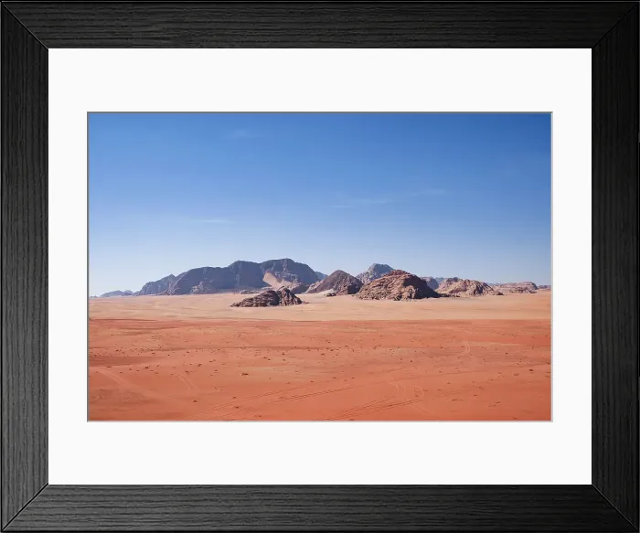 Framed Print : Red sand and mountains under a blue sky in the Wadi Rum desert, Jordan, Middle East Framed Print : Red sand and mountains under a blue sky in the Wadi Rum desert, Jordan, Middle East