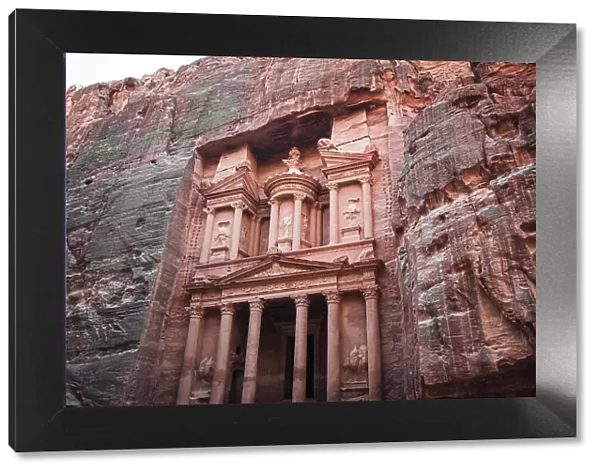 Treasury (Al Khazneh) monument carved into the stone on the side of a mountain, Petra, UNESCO World Heritage Site, Jordan, Middle East