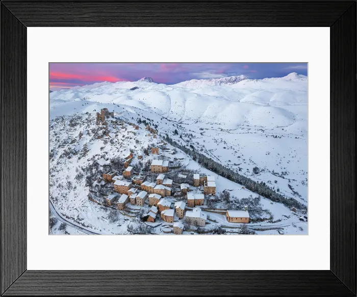 Framed Print : Aerial winter view of the snow covered medieval village of Rocca Calascio with the castle and pink sky at sunset, Rocca Calascio, Gran Sasso e Monti della Laga National Park, Campo Imperatore, L'Aquila province, Abruzzo region, Italy, Europe Framed Print : Aerial winter view of the snow covered medieval village of Rocca Calascio with the castle and pink sky at sunset, Rocca Calascio, Gran Sasso e Monti della Laga National Park, Campo Imperatore, L'Aquila province, Abruzzo region, Italy, Europe