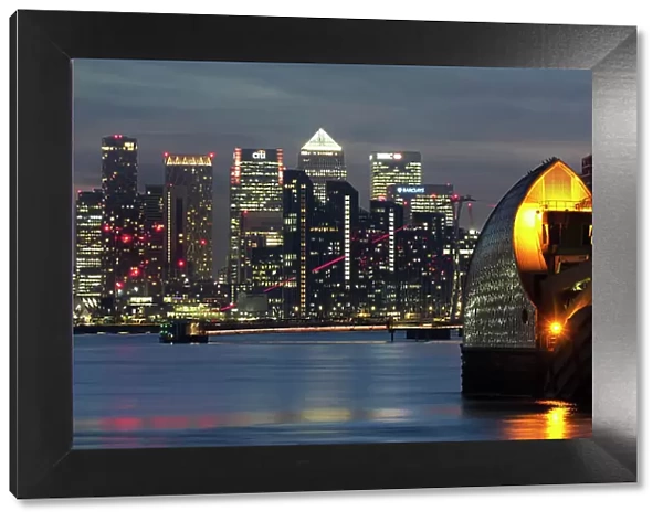 Canary Wharf, Docklands, and Thames Barrier at dusk, London, England, United Kingdom, Europe