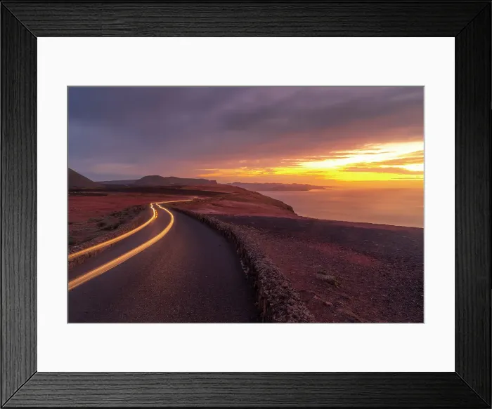 Framed Print : View of trail lights and volcanic coastline from Mirador del Rio at sunset, Lanzarote, Las Palmas, Canary Islands, Spain, Atlantic, Europe Framed Print : View of trail lights and volcanic coastline from Mirador del Rio at sunset, Lanzarote, Las Palmas, Canary Islands, Spain, Atlantic, Europe