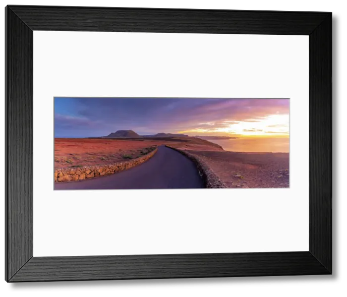 Framed Print : View of road and volcanic coastline from Mirador del Rio at sunset, Lanzarote, Las Palmas, Canary Islands, Spain, Atlantic, Europe Framed Print : View of road and volcanic coastline from Mirador del Rio at sunset, Lanzarote, Las Palmas, Canary Islands, Spain, Atlantic, Europe