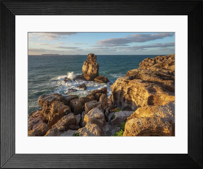 Framed Print : Waves crashing against rock stack at Cabo Carvoeiro in evening sunlight with Ilha da Berlenga in the distance, Peniche, Centro Region, Estremadura, Portugal, Europe Framed Print : Waves crashing against rock stack at Cabo Carvoeiro in evening sunlight with Ilha da Berlenga in the distance, Peniche, Centro Region, Estremadura, Portugal, Europe