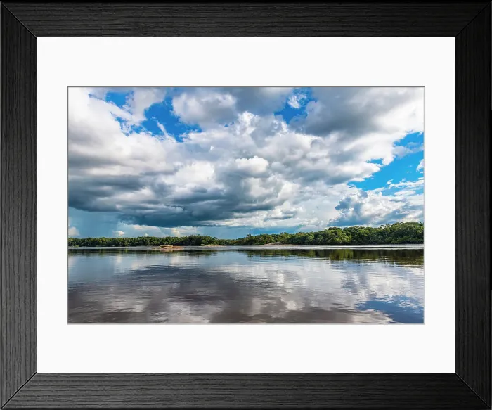 Framed Print : Reflections of clouds in the Casiquiare River in the deep south of Venezuela, South America Framed Print : Reflections of clouds in the Casiquiare River in the deep south of Venezuela, South America
