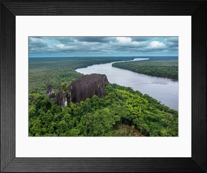 Framed Print : Aerial of the Curimacare Rock on the Casiquiare River in the deep south of Venezuela, South America Framed Print : Aerial of the Curimacare Rock on the Casiquiare River in the deep south of Venezuela, South America