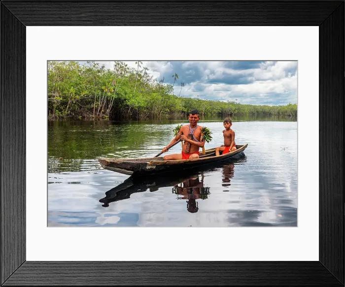 Framed Print : Father and son from the Yanomami tribe in a canoe, southern Venezuela, South America Framed Print : Father and son from the Yanomami tribe in a canoe, southern Venezuela, South America