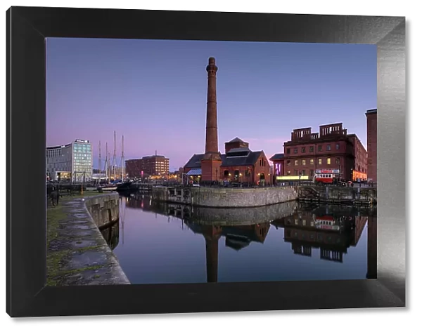 The Pumphouse and buildings of Albert Dock viewed over Canning Dock at twilight, Liverpool Waterfront, Liverpool, Merseyside, England, United Kingdom, Europe