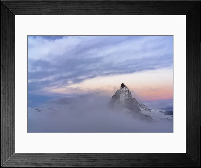 Framed Print : Clouds over Matterhorn peak emerging from mist at sunrise, Gornergrat, Zermatt, canton of Valais, Switzerland, Europe Framed Print : Clouds over Matterhorn peak emerging from mist at sunrise, Gornergrat, Zermatt, canton of Valais, Switzerland, Europe