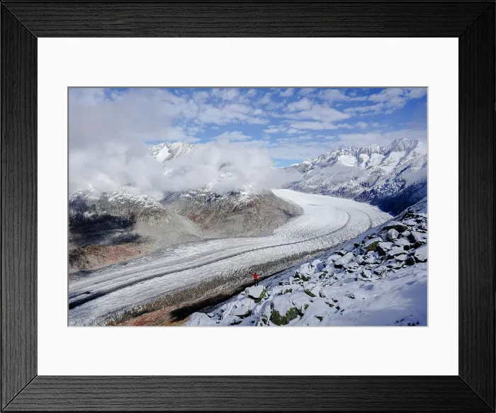 Framed Print : Hiker admiring Aletsch Glacier from viewpoint standing on top of rocks, UNESCO World Heritage Site, Bernese Alps, Valais canton, Switzerland, Europe Framed Print : Hiker admiring Aletsch Glacier from viewpoint standing on top of rocks, UNESCO World Heritage Site, Bernese Alps, Valais canton, Switzerland, Europe