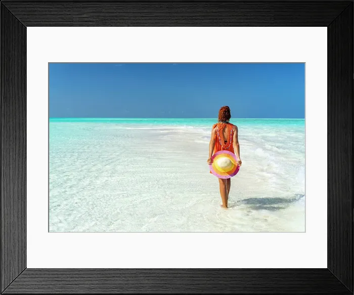 Framed Print : Mid adult woman enjoying walking on a beach, Zanzibar, Tanzania, East Africa, Africa Framed Print : Mid adult woman enjoying walking on a beach, Zanzibar, Tanzania, East Africa, Africa