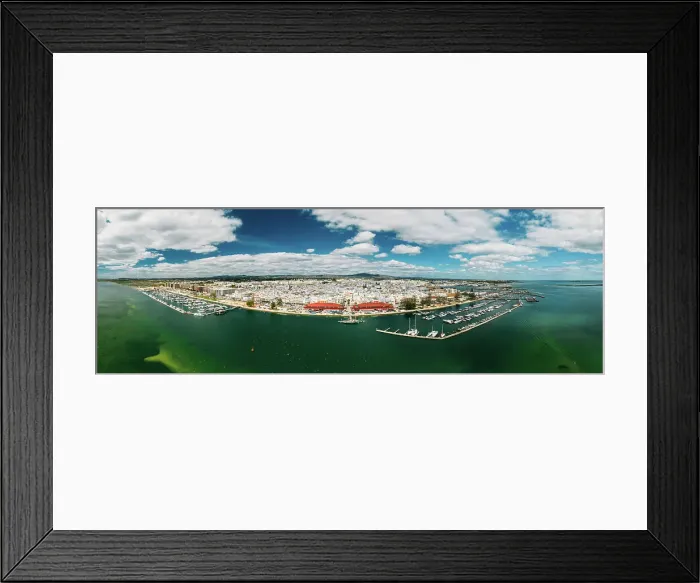 Framed Print : Aerial panoramic drone view of Olhao, officially known as Olhao da Restauracao, a city and municipality in the Algarve region, southern Portugal, Europe Framed Print : Aerial panoramic drone view of Olhao, officially known as Olhao da Restauracao, a city and municipality in the Algarve region, southern Portugal, Europe