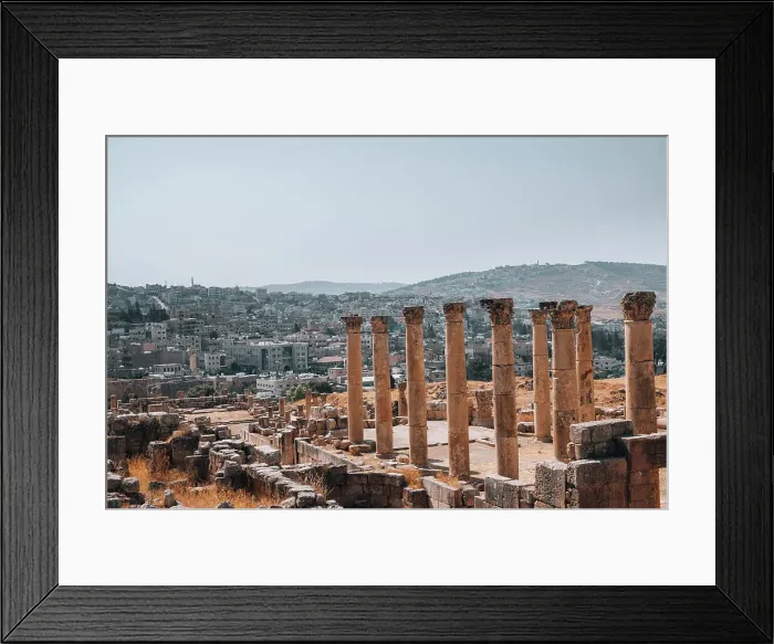 Framed Print : The ruins of a Roman temple, with the modern city of Jerash in the background, Jerash, Jordan, Middle East Framed Print : The ruins of a Roman temple, with the modern city of Jerash in the background, Jerash, Jordan, Middle East