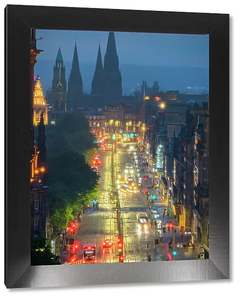 High angle view of Princes Street and St. Mary's Cathedral in background at twilight, UNESCO World Heritge Site, Old Town, Edinburgh, Lothian, Scotland, United Kingdom, Europe