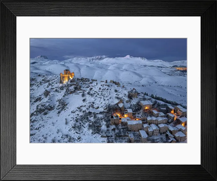 Framed Print : Winter view of the snow covered illuminated medieval village of Rocca Calascio with the castle at dusk, Rocca Calascio, Gran Sasso e Monti della Laga National Park, Campo Imperatore, L'Aquila province, Abruzzo region, Italy, Europe Framed Print : Winter view of the snow covered illuminated medieval village of Rocca Calascio with the castle at dusk, Rocca Calascio, Gran Sasso e Monti della Laga National Park, Campo Imperatore, L'Aquila province, Abruzzo region, Italy, Europe
