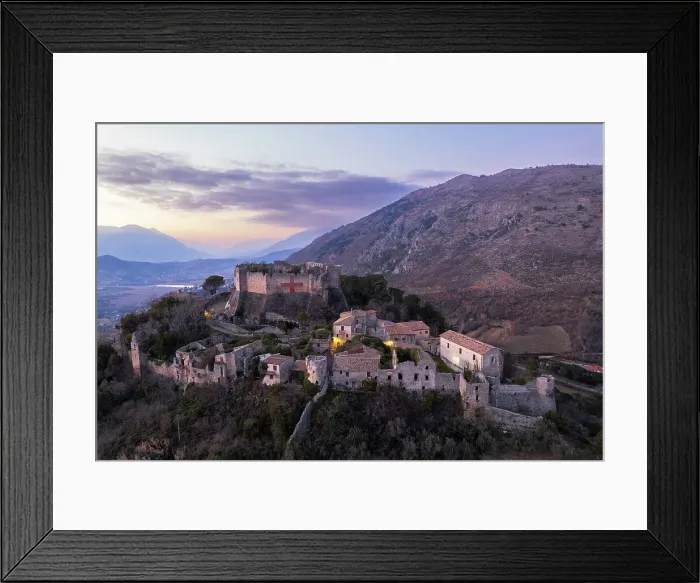 Framed Print : Aerial view of the medieval castle of Vicalvi, with red cross painted on the perimetral wall, overlooking the illuminated old village at dusk, Vicalvi, Frosinone province, Ciociaria, Latium region, Lazio, Italy, Europe Framed Print : Aerial view of the medieval castle of Vicalvi, with red cross painted on the perimetral wall, overlooking the illuminated old village at dusk, Vicalvi, Frosinone province, Ciociaria, Latium region, Lazio, Italy, Europe