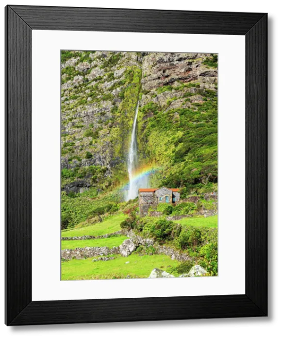 Framed Print : Scenic view of the waterfall of Poco do Bacalhau falling behiend a house with rainbow, Faja Grande, Lajes das Flores, Flores Island (Ilha das Flores), Azores archipelago, Portugal, Atlantic, Europe Framed Print : Scenic view of the waterfall of Poco do Bacalhau falling behiend a house with rainbow, Faja Grande, Lajes das Flores, Flores Island (Ilha das Flores), Azores archipelago, Portugal, Atlantic, Europe