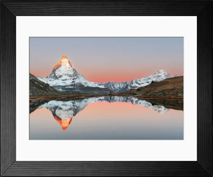 Framed Print : Hiker admiring the Matterhorn reflected in the Riffelsee lake at sunrise, Gornergrat, Zermatt, canton of Valais, Switzerland, Europe