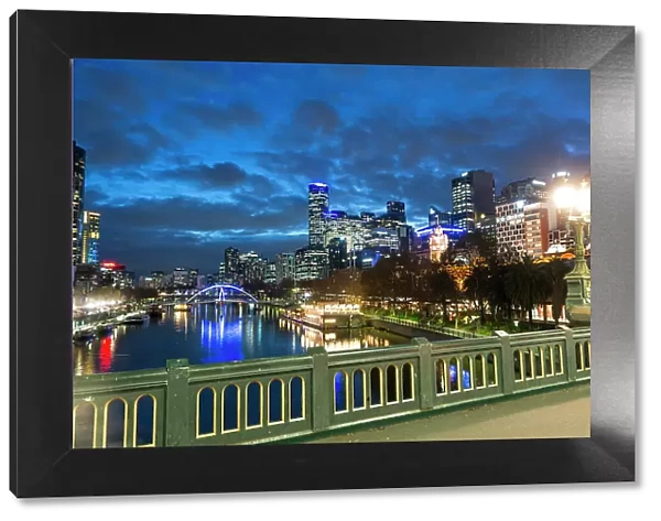 Both banks of Yarra River, including well-known Southbank, in City of Melbourne at twillight, Victoria, Australia, Pacific