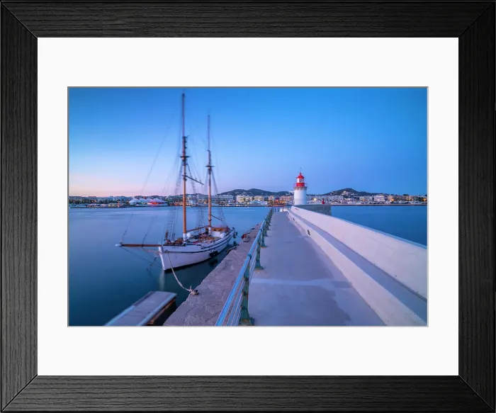Framed Print : View of harbour lighthouse and sailing ship at dusk, UNESCO World Heritage Site, Ibiza Town, Eivissa, Balearic Islands, Spain, Mediterranean, Europe Framed Print : View of harbour lighthouse and sailing ship at dusk, UNESCO World Heritage Site, Ibiza Town, Eivissa, Balearic Islands, Spain, Mediterranean, Europe