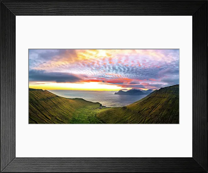Framed Print : Dramatic sky with clouds at sunrise over the coastal village of Gjogv, aerial view, Eysturoy Island, Faroe Islands, Denmark, Europe Framed Print : Dramatic sky with clouds at sunrise over the coastal village of Gjogv, aerial view, Eysturoy Island, Faroe Islands, Denmark, Europe