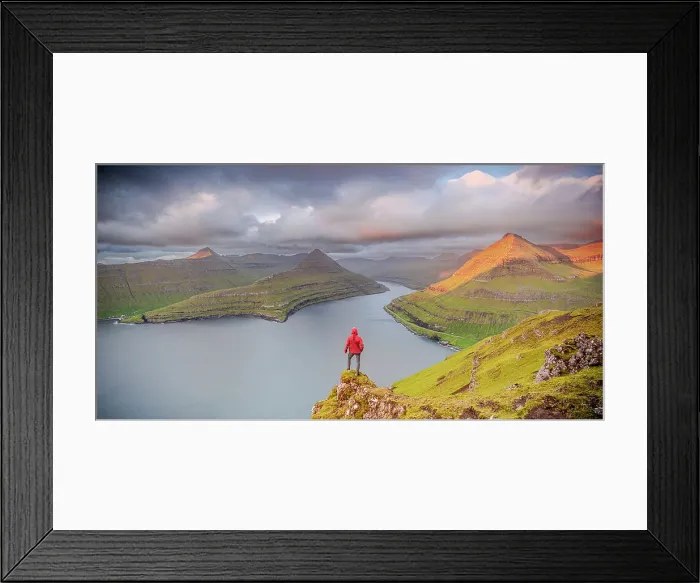 Framed Print : One man contemplating the sky at dawn standing on rocks above a fjord, Eysturoy Island, Faroe Islands, Denmark, Europe Framed Print : One man contemplating the sky at dawn standing on rocks above a fjord, Eysturoy Island, Faroe Islands, Denmark, Europe
