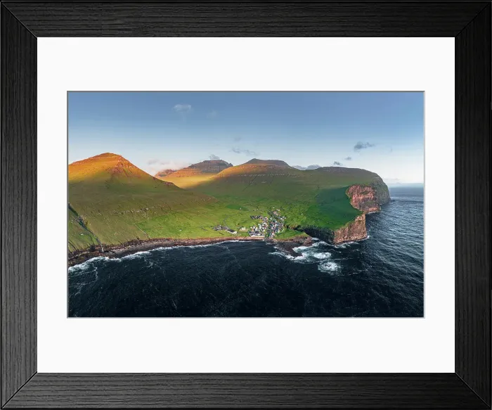 Framed Print : Aerial panoramic view of the village of Gjogv on cliffs washed by the ocean, Eysturoy Island, Faroe Islands, Denmark, Europe Framed Print : Aerial panoramic view of the village of Gjogv on cliffs washed by the ocean, Eysturoy Island, Faroe Islands, Denmark, Europe