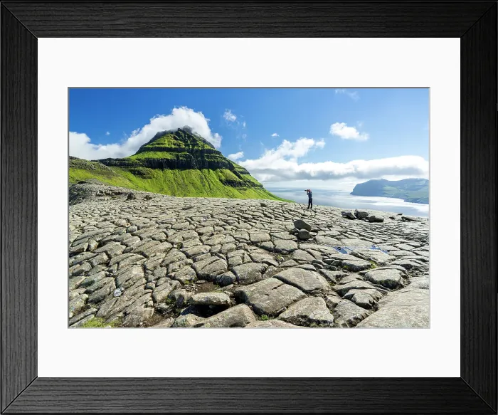 Framed Print : One tourist photographing Skaelingsfjall mountain standing on cracked soil in summer, Streymoy Island, Faroe Islands, Denmark, Europe Framed Print : One tourist photographing Skaelingsfjall mountain standing on cracked soil in summer, Streymoy Island, Faroe Islands, Denmark, Europe