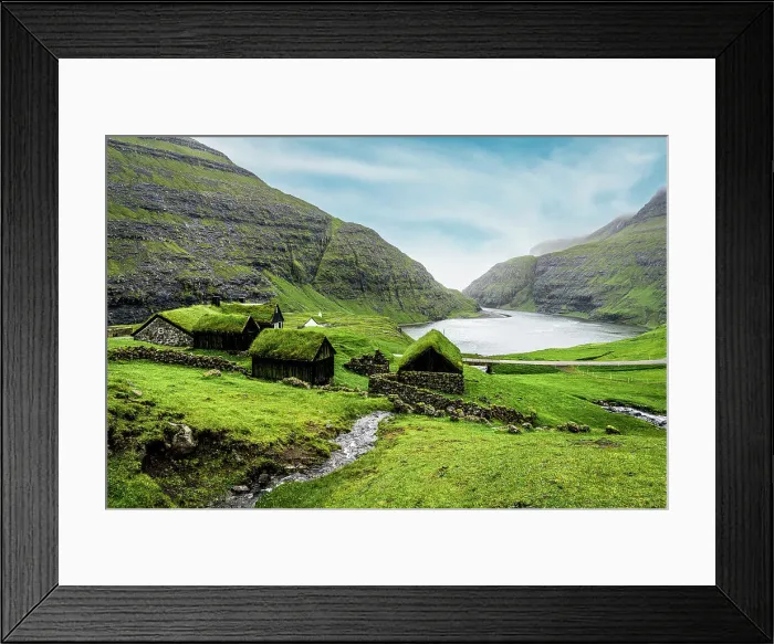 Framed Print : River flowing to the ocean crossing green meadows with grass-roof houses, Saksun, Streymoy Island, Faroe Islands, Denmark, Europe Framed Print : River flowing to the ocean crossing green meadows with grass-roof houses, Saksun, Streymoy Island, Faroe Islands, Denmark, Europe