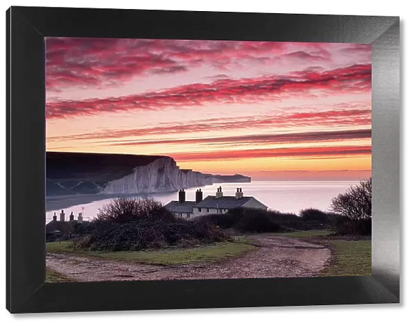 The Seven Sisters white chalk cliffs at dawn from Cuckmere Haven, South Downs National Park, East Sussex, England, United Kingdom, Europe