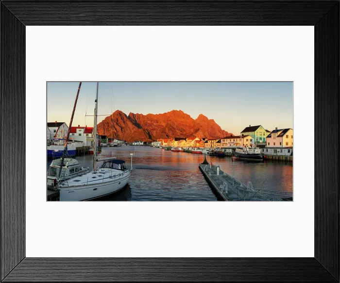 Framed Print : Harbor and village of Henningsvaer at sunset with mountains on background, Nordland county, Lofoten Islands, Norway, Scandinavia, Europe Framed Print : Harbor and village of Henningsvaer at sunset with mountains on background, Nordland county, Lofoten Islands, Norway, Scandinavia, Europe