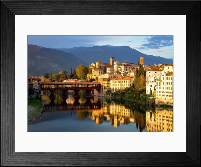 Framed Print : Sunset over the iconic Ponte Vecchio bridge reflected in river Brenta, Bassano Del Grappa, Vicenza province, Veneto, Italy, Europe Framed Print : Sunset over the iconic Ponte Vecchio bridge reflected in river Brenta, Bassano Del Grappa, Vicenza province, Veneto, Italy, Europe