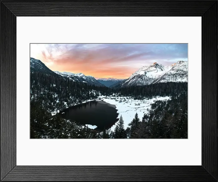 Framed Print : Aerial panoramic view of snowy forest and frozen lake Entova at sunrise, Valmalenco, Valtellina, Lombardy, Italy, Europe Framed Print : Aerial panoramic view of snowy forest and frozen lake Entova at sunrise, Valmalenco, Valtellina, Lombardy, Italy, Europe