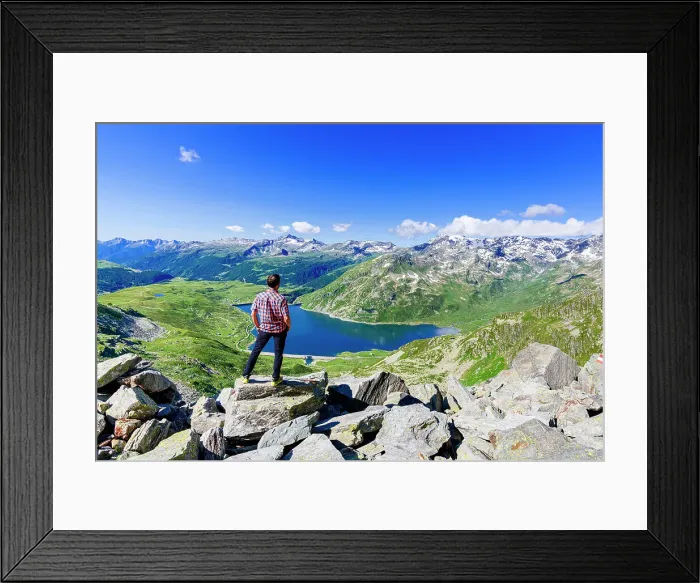Framed Print : One man looking at the alpine lake of Montespluga standing on rocks, Madesimo, Valle Spluga, Valtellina, Lombardy, Italy, Europe Framed Print : One man looking at the alpine lake of Montespluga standing on rocks, Madesimo, Valle Spluga, Valtellina, Lombardy, Italy, Europe