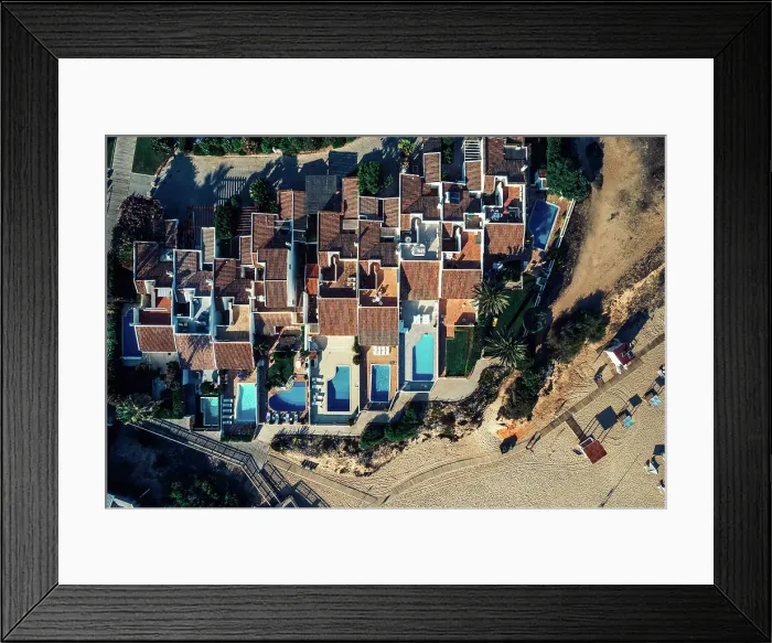 Framed Print : Aerial drone top down view of luxurious residences in Vale do Lobo, iconic beachfront resort and home, near Quarteira in Algarve, Portugal, Europe Framed Print : Aerial drone top down view of luxurious residences in Vale do Lobo, iconic beachfront resort and home, near Quarteira in Algarve, Portugal, Europe