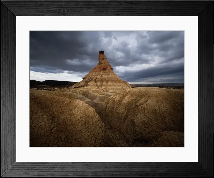 Framed Print : Castildetierra rock formation under a cloudy sky, the symbol of badlands of Bardenas Reales desert, Navarre, Spain, Europe Framed Print : Castildetierra rock formation under a cloudy sky, the symbol of badlands of Bardenas Reales desert, Navarre, Spain, Europe