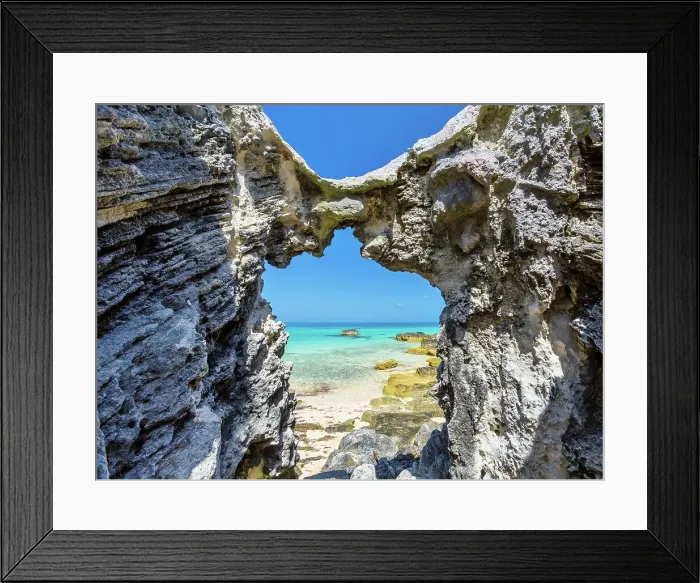 Framed Print : Blue and turquoise Sargasso Sea, glimpsed through an arch in the island's distinctive rocks, Bermuda, Atlantic, North America Framed Print : Blue and turquoise Sargasso Sea, glimpsed through an arch in the island's distinctive rocks, Bermuda, Atlantic, North America